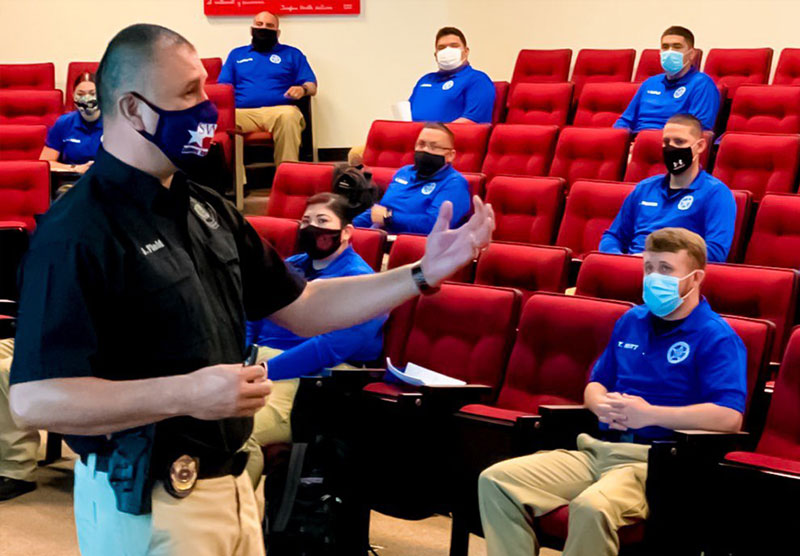 Law Enforcement Academy Cadets sitting in auditorium
