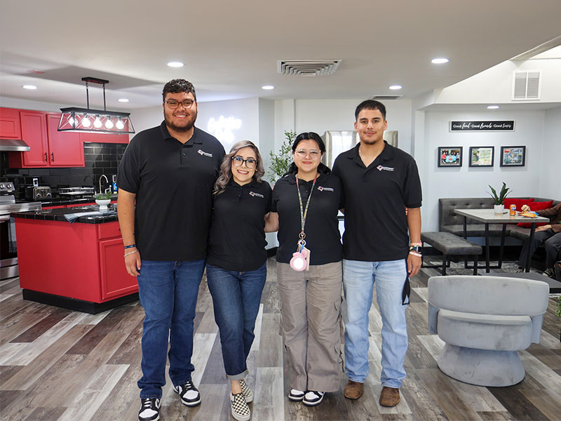 Uvalde Campus Hubbard Hall Resident Advisors pose at the newly remodeled dorm kitchen.