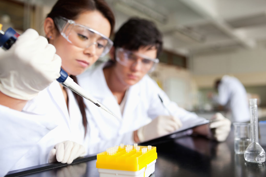 Chemistry students in a lab environment.